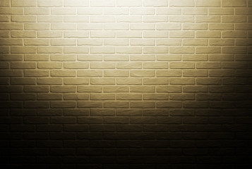 yellow brick wall with light effect and shadow, abstract background photo