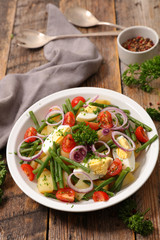 vegetable salad with potato,egg,bean and tomato