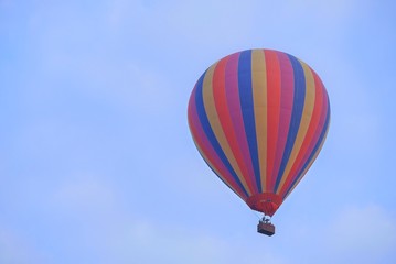 Hot air balloon flying to the sky in the morning at Vangvieng, Laos.