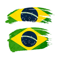 Grunge brush stroke with Brazil national flag on white