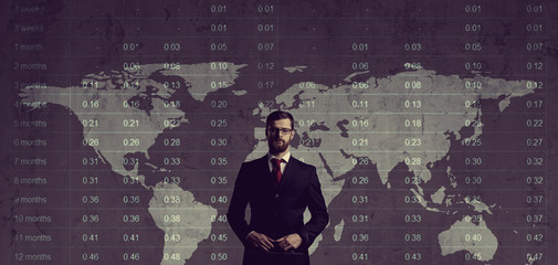 Businessman standing over diagram. World map background. Business, office, career concept.