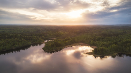 The coast of the lake at sunset