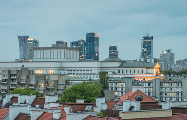Warsaw, Poland, panorama of city center with modern skyscrapers and old city roofs