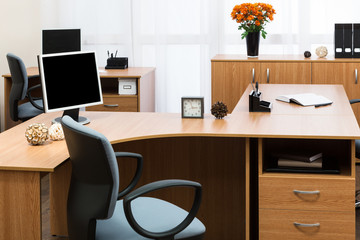 gerberas in the vase on desk