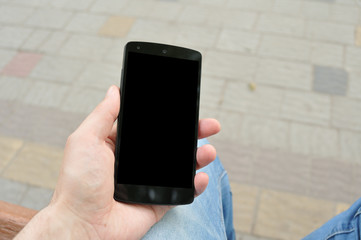 Black phone in hand