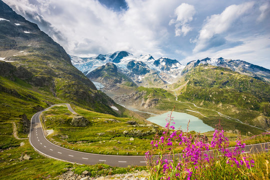 Fototapeta Winding mountain pass road in the Alps
