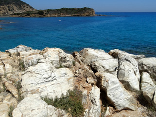 Fototapeta na wymiar Beautiful crystal clear sea water and beach in Sardinia island