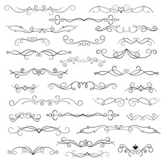Obraz premium Decorative elements and calligraphic workpiece. Decorative monograms and calligraphic borders. Classic design elements for wedding invitations. Set isolated on white background.
