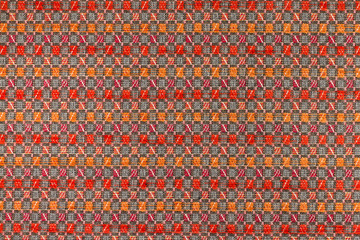 Dark red ang orange background with geometric patterns