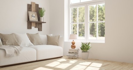 Obraz na płótnie Canvas White room with sofa and green landscape in window. Scandinavian interior design. 3D illustration