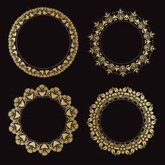 Set of round ornamental frames. Vintage gold frames on a black background.