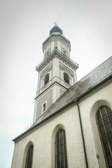 A low angle view of St Georges Church belfry in Freising, Germany.