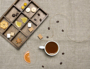 Cup of coffee, candies, coffee