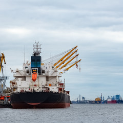 Fototapeta premium Black cargo ship