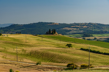 Rural landscape of valleys in summer in the province of siena in tuscany italy