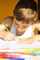 Boy writing homework and study at home