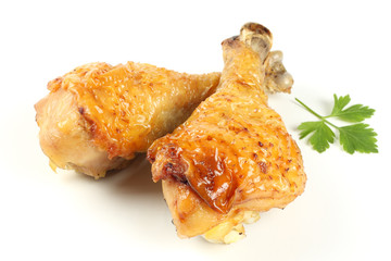 Grilled chicken leg isolated on white background