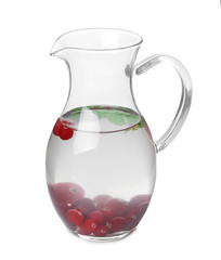 Tasty refreshing lemonade with cranberry in glass jug on white background