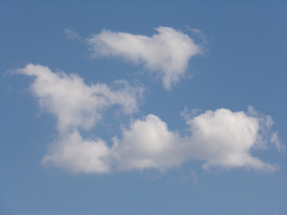  Blue sky with clouds with place for your text.Clouds with a beautiful format, making the sky into a work of art.