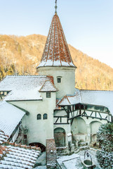 Bran castle in inner yard in a winter day in Transylvania, Romania