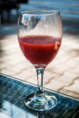 Wine glasses with red drink inside