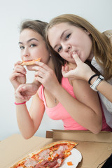 happy girls eats pizza on white background