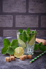 Summer drink mojito with rum, mint, ice and lime