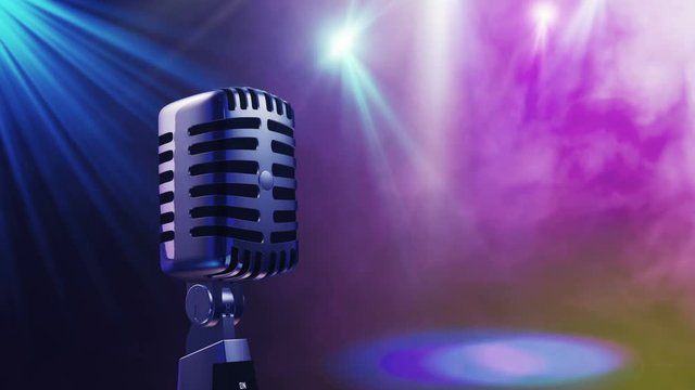 Retro microphone against a background of better light and smoke