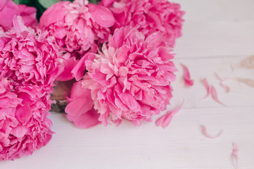 Bouquet of pink peonies on a wooden table. Gift Valentine's Day.Flowers background