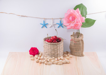 Cherries with pistachio ,starfish,flower