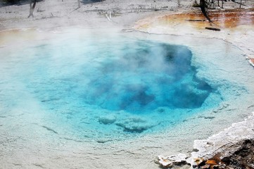 Bright blue geothermal pool at Yellowstone National Park