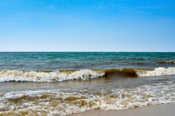 Waves of the Black Sea against the blue sky. Seascape, sea in the summer.