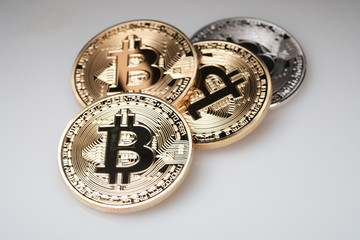 Golden bitcoin isolated on white background