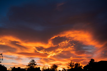 Obraz na płótnie Canvas Dramatic Desert Sunset Clouds