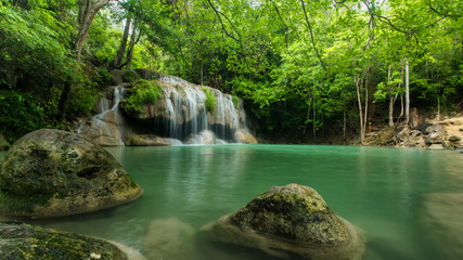 Naklejka premium Beautiful and Breathtaking green waterfall, Erawan's waterfall, Located Kanchanaburi Province, Thailand