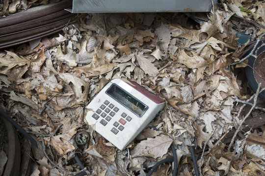 Obsolete calculator in junkyard
