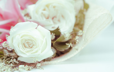 Closeup shot of fresh rose and processed in vintage style
