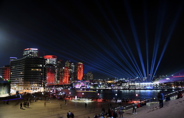 City lights and laser show in Circular Quay during the Sydney Vivid show, the free annual outdoor...