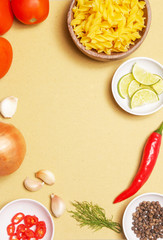 Obraz na płótnie Canvas Ingredients for cooking Italian pasta - top view 