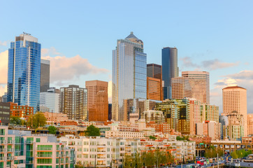 Beautiful view of Seattle waterfront and skyline at sunset. Marina at pier 66, and the great wheel...