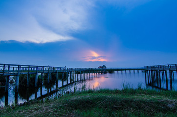 bridge to the lake, sunset, thailand