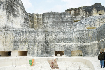 The exploitation of limestone hills forming a unique architectural in Jeddih or Jaddih Hill Madura Island, Indonesia