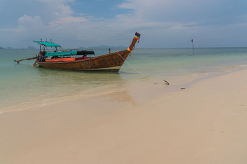 Fototapeta na wymiar longtail boat on beach,krabi,thailand