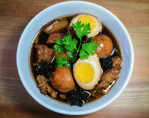 Eggs and pork in brown sauce frogs.