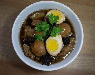 Eggs and pork in brown sauce frogs.