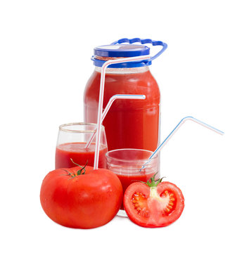 Tomatoes and tomato juice in jar and two glasses