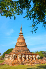 Fototapeta premium Wat Sorasak Temple at Sukhothai Historical Park, a UNESCO World Heritage Site in Thailand