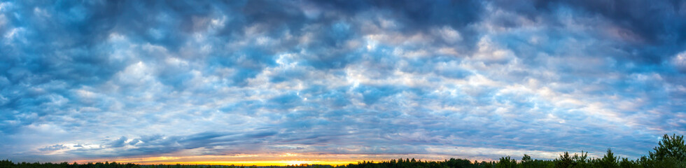 panorama a landscape with sky and clouds at sunrise