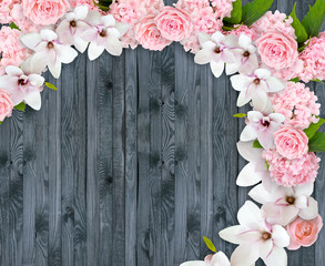 Magnolia flowers with roses, hortensia and place for your text