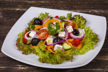 Fresh vegetable greek salad on the table